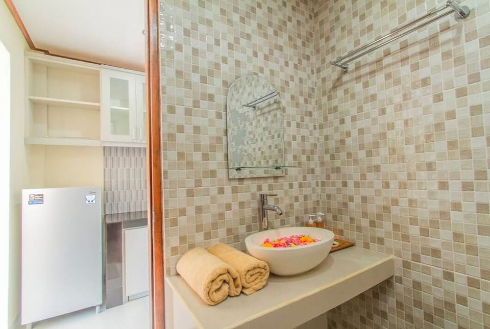 Family Room, Balcony, Garden View | Desk, laptop workspace, free WiFi