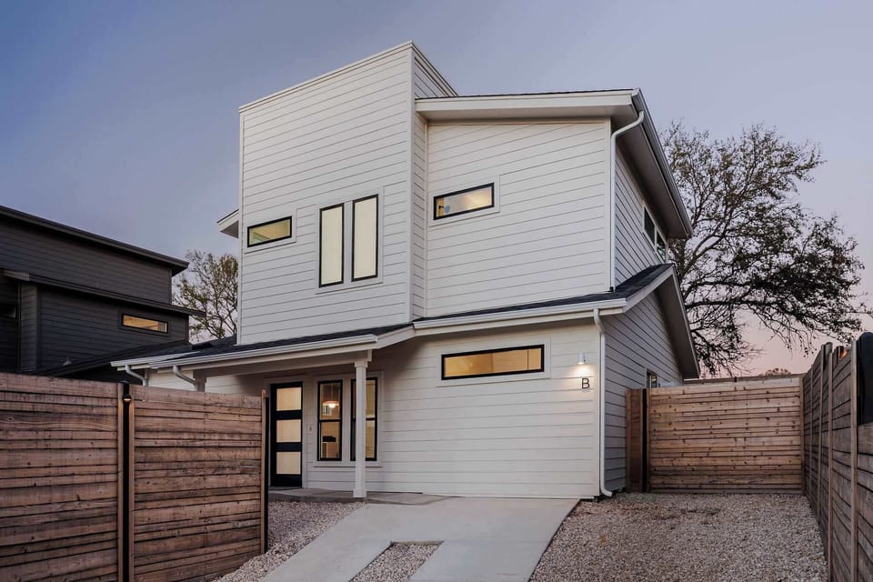 Home Exterior | Modern Multi-Level Design | Private Driveway | Fully Fenced Entry