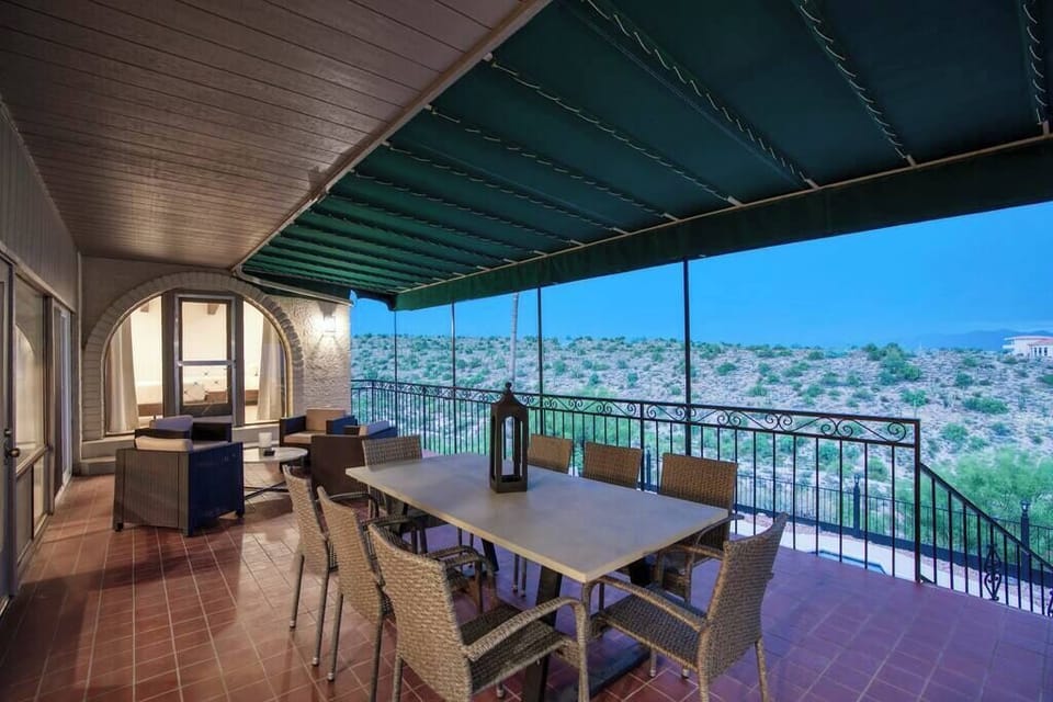 Alfresco dining perfection. Covered patio with BBQ grill and breathtaking vistas.