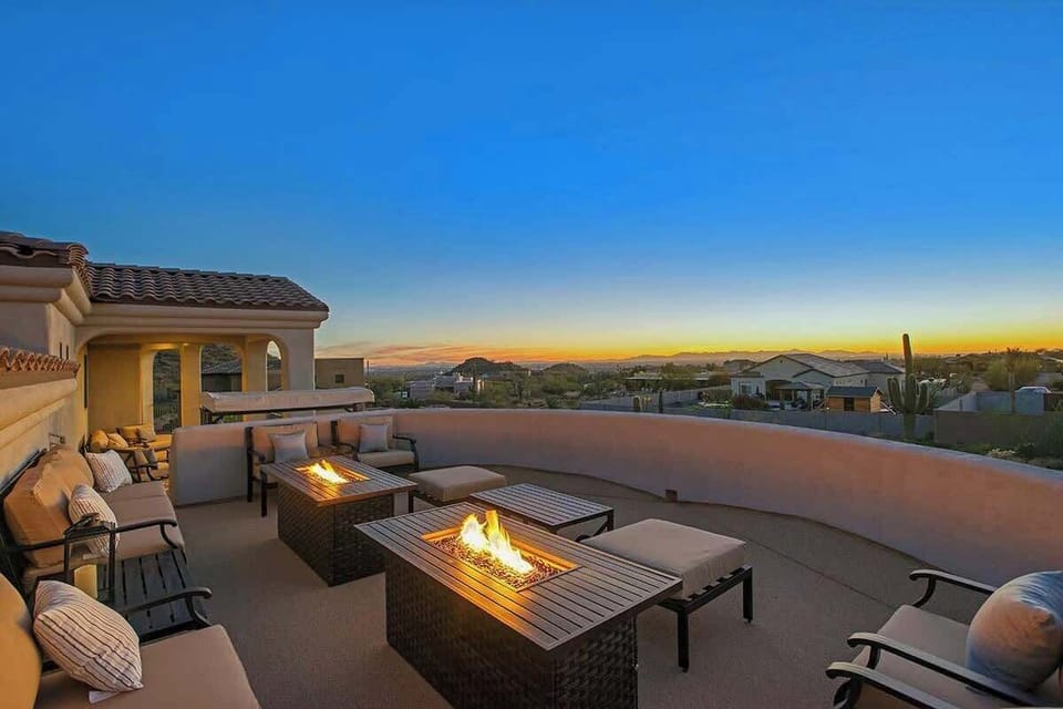 Sunset patio views overlooking the Mesa valley—perfect for evenings outdoors