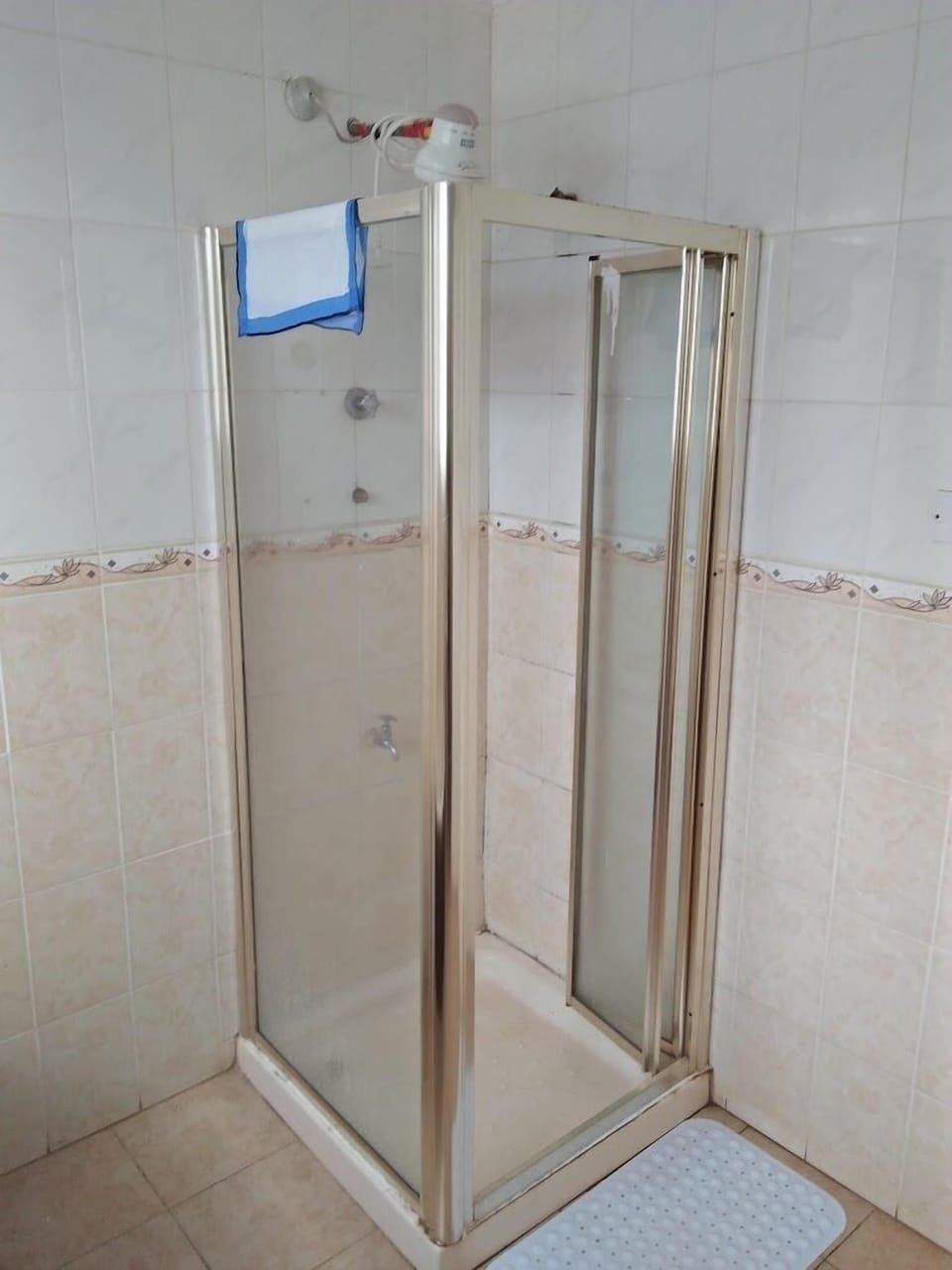 Standard Double Room, Garden View | Bathroom | Shower, slippers, towels, soap