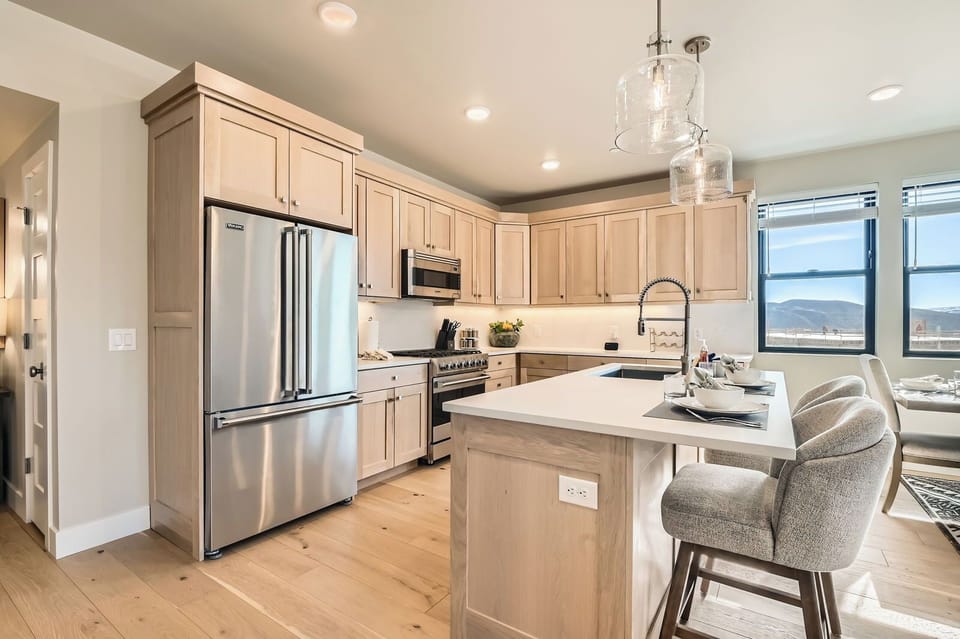 Whip up feasts in this gourmet chef's kitchen featuring granite countertops, stainless steel appliances, and a spacious island. Nestled near Deer Valley Resort, it's the perfect mountain retreat.