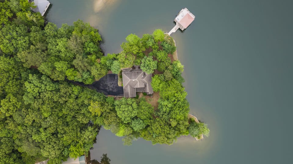 The aerial shot shows how special this property is. Over 500ft of lake frontage.