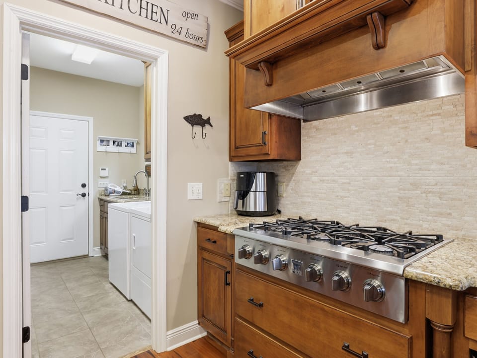 The gas cooktop is a guests favorite. 6 burners and a double oven. 