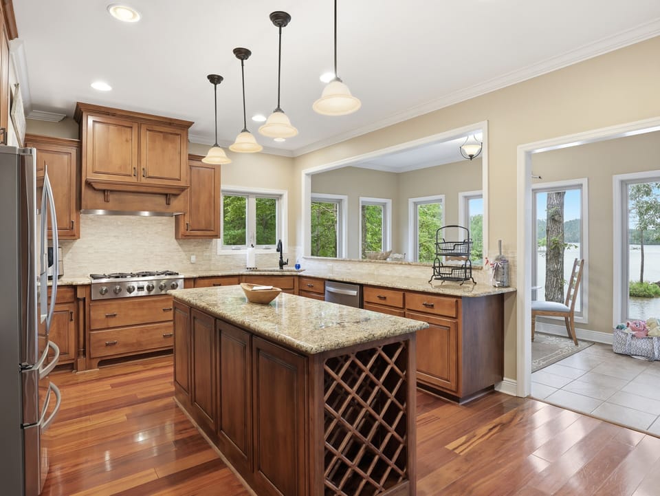 The chefs kitchen has granite countertops and lots of space for a big family. 