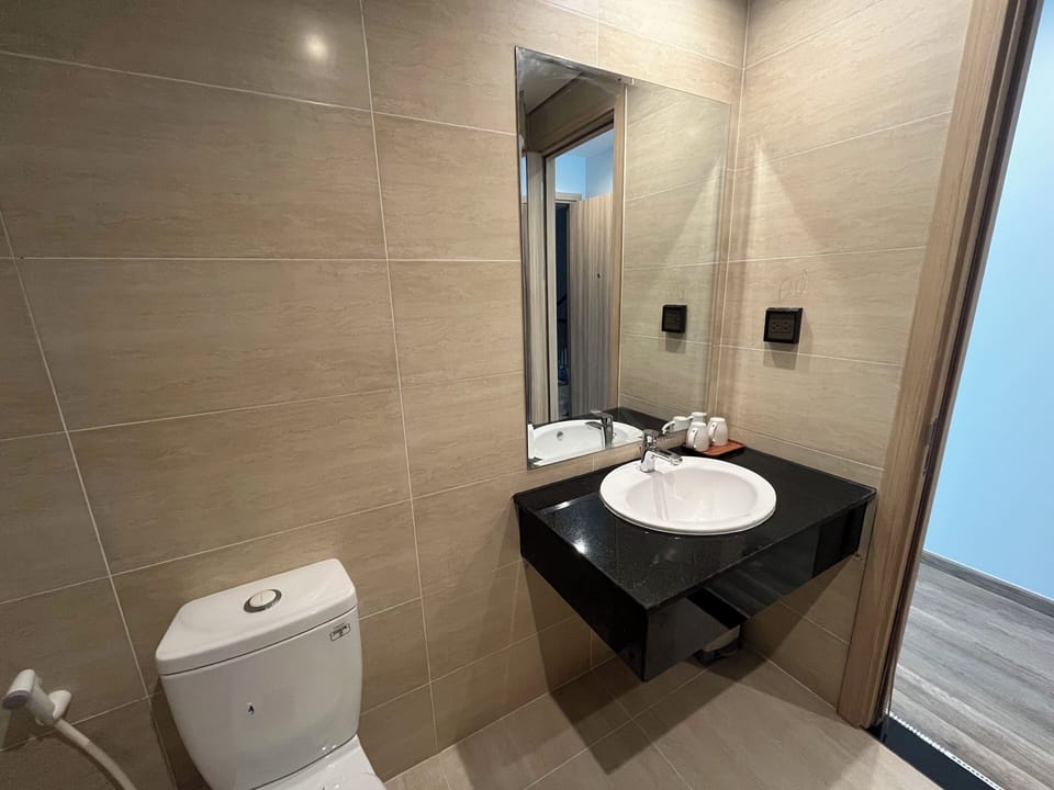 Shower, free toiletries, hair dryer, slippers