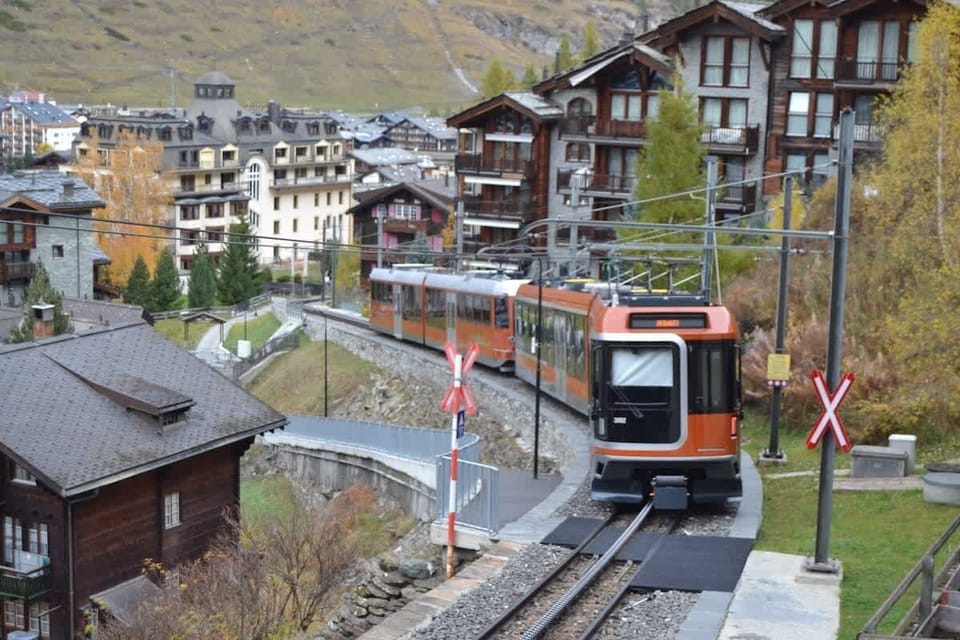 Gornergrat train passing in front of house St.  George