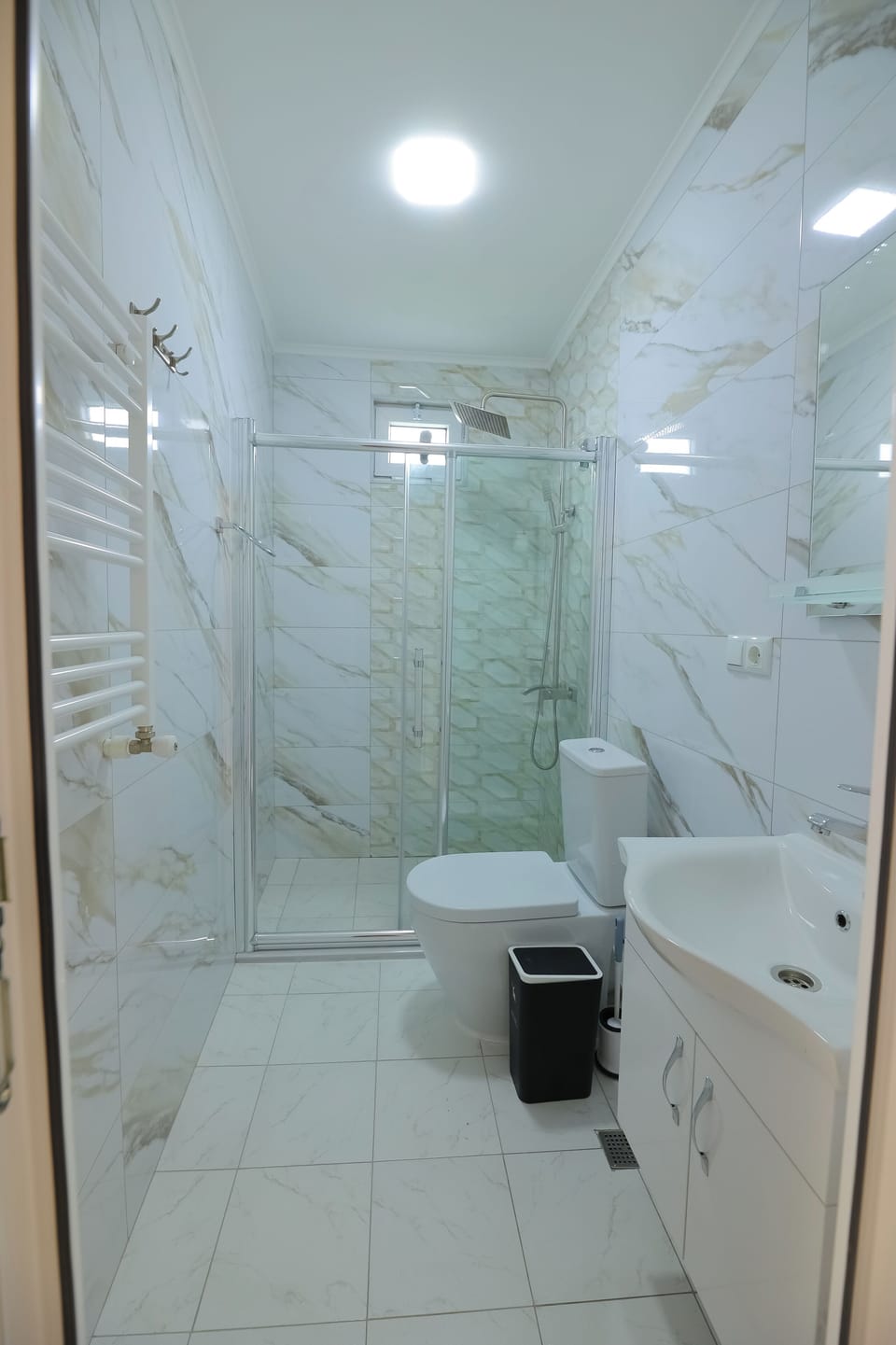 Family Suite, Balcony, Pool View | Bathroom | Shower, hair dryer, slippers, bidet