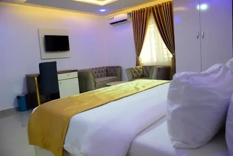 Family Room, Balcony, City View | Desk, laptop workspace, blackout drapes, soundproofing