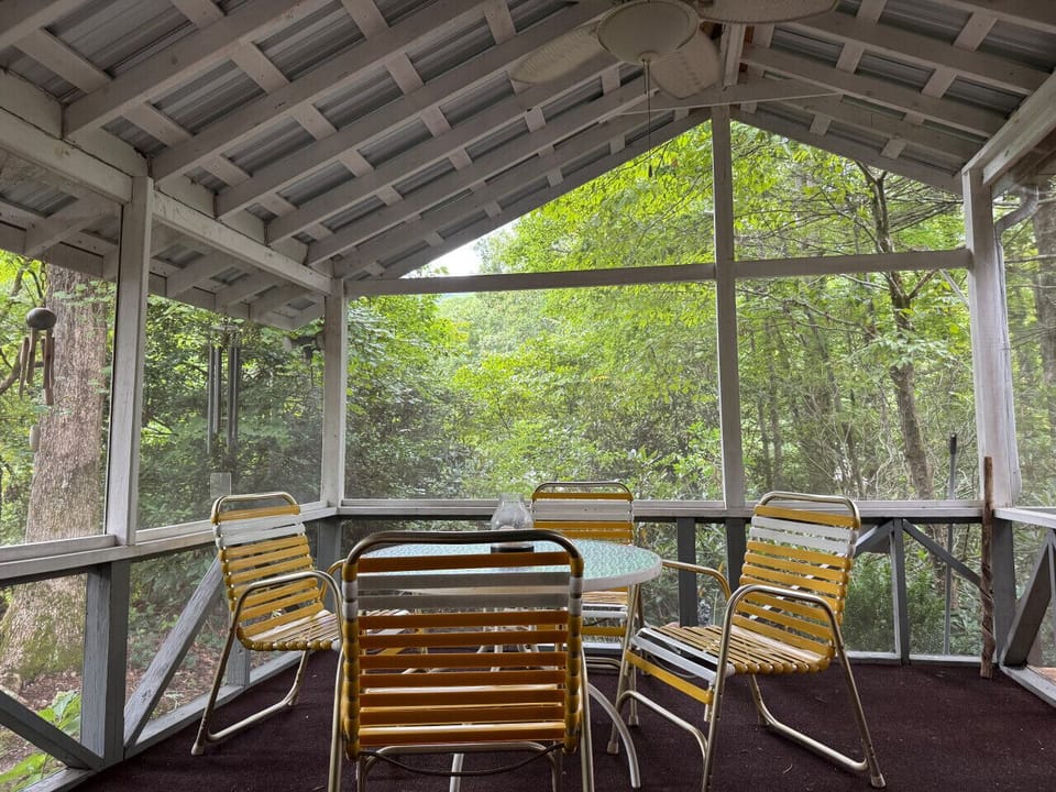 Sip sweet tea or wine on the breezy screened-in porch.