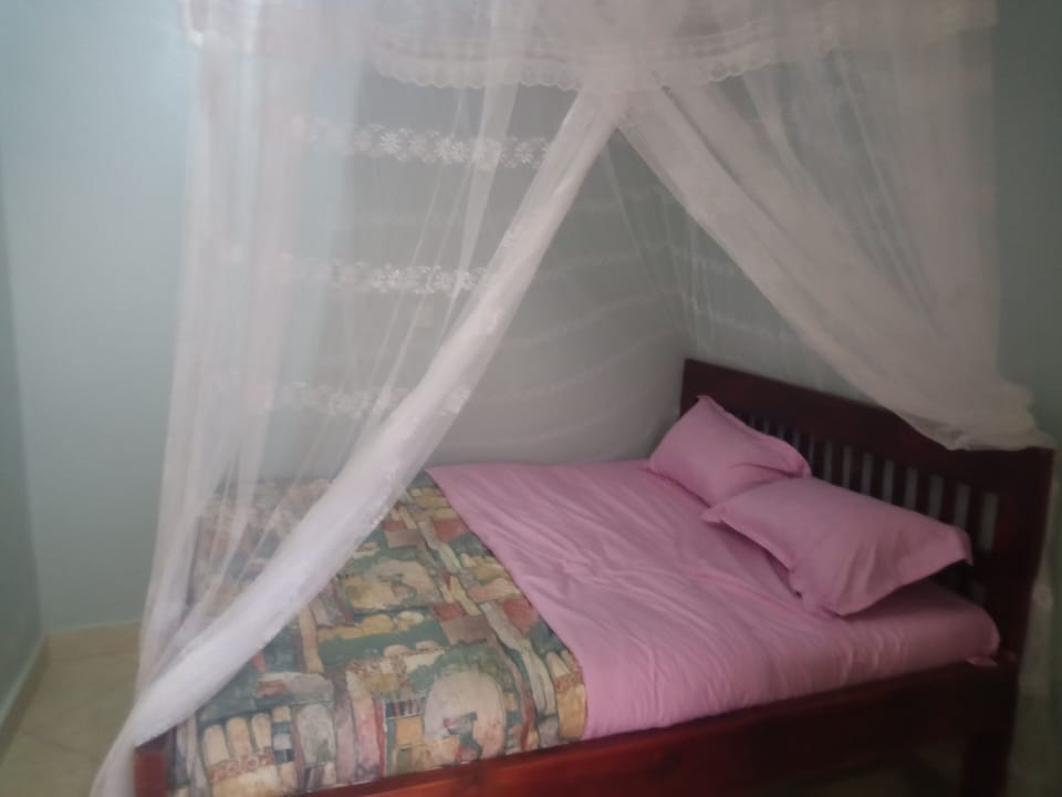 Basic Double Room, Garden View | Desk, laptop workspace, free WiFi