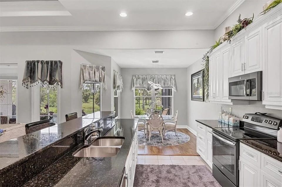 Bright, fully-equipped kitchen with lots of countertop and storage space