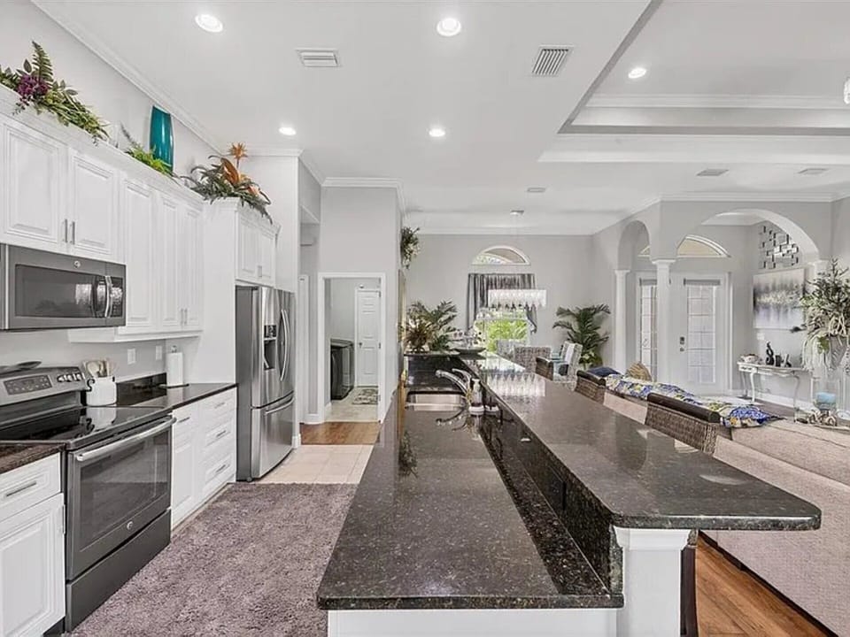 Bright, fully-equipped kitchen with lots of countertop and storage space