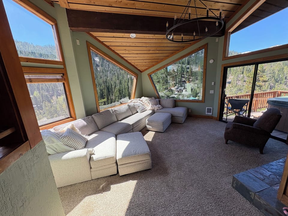 Open floor plan with sunny exposure and views to the top of Alpine Ski Area