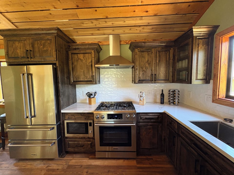 new kitchen, gas appliances, quartz countertops, hickory custom cabinets