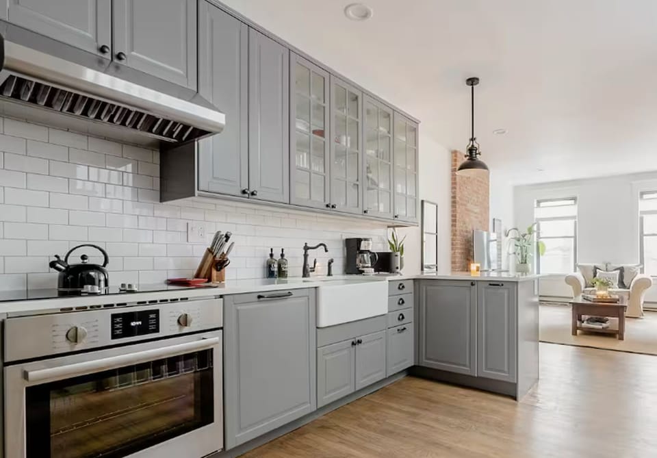 Modern kitchen design with sleek cabinets and stainless steel appliances.