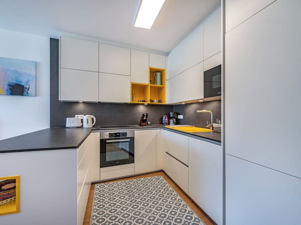 Kitchen, Kitchen Appliance, Major Appliance, Flooring, Wood, Countertop, Interior Design, Cabinetry, Floor, Kitchen Stove