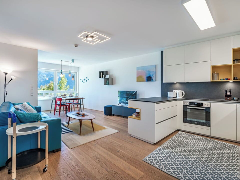 Furniture, Interior Design, Flooring, Kitchen, Floor, Ceiling, Room, Wood, Apartment, Chair