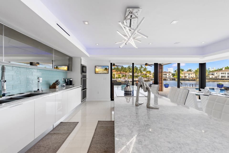 Fully equipped chef kitchen modern island stylish finishes and open concept layout