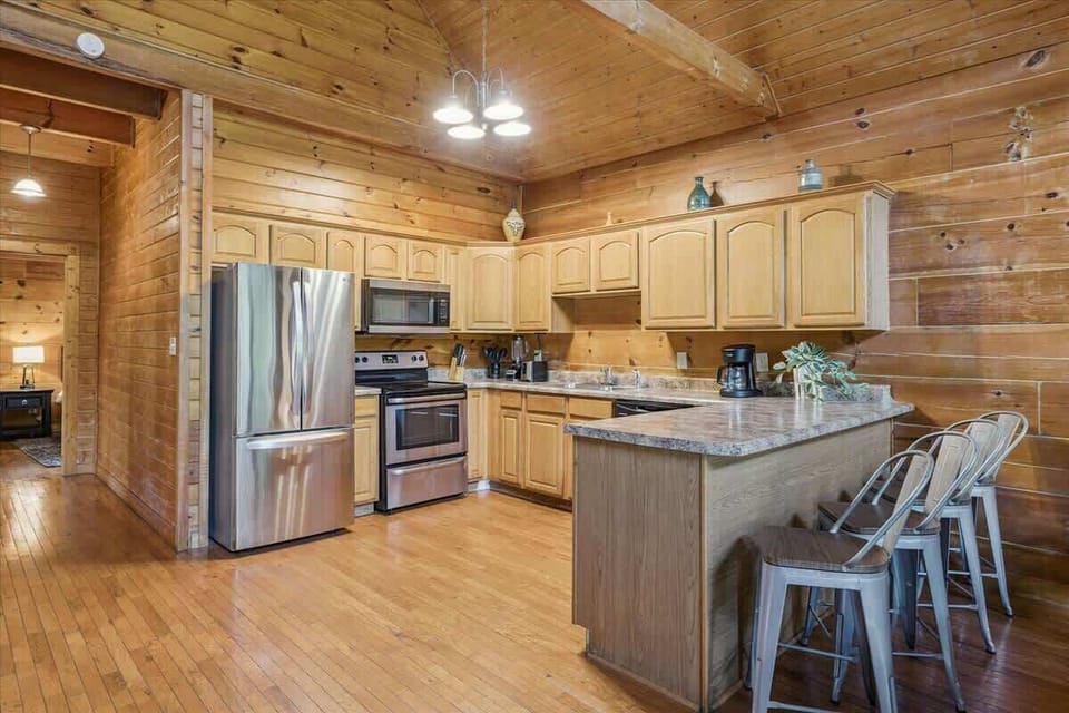Kitchen Paradise: Create culinary delights in style with modern appliances and warm wood accents!