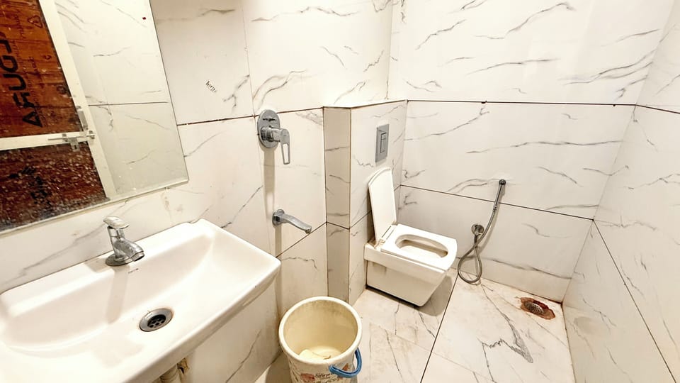 Shower, rainfall showerhead, towels, soap