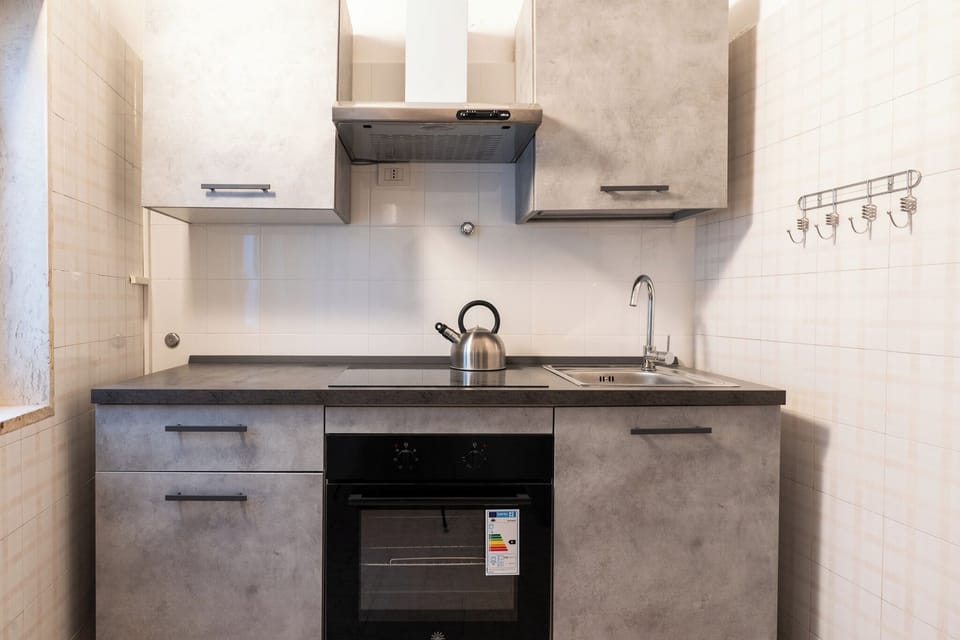 Apartment, 2 Bedrooms | Private kitchen | Fridge, oven, stovetop, cookware/dishes/utensils