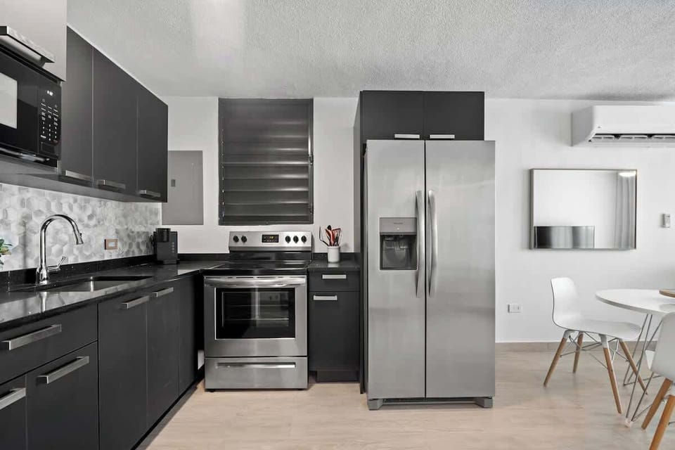 Whip up meals with ease in our sleek, efficient kitchen.