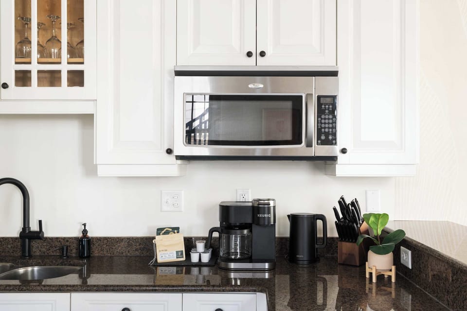 Fully equipped kitchen with bar top seating 