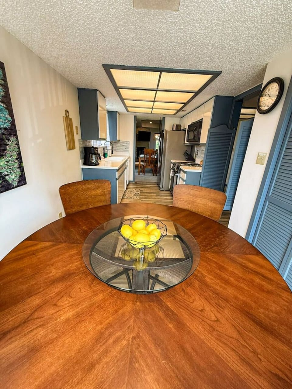 Updated kitchen and dining area with modern appliances and inviting layout.