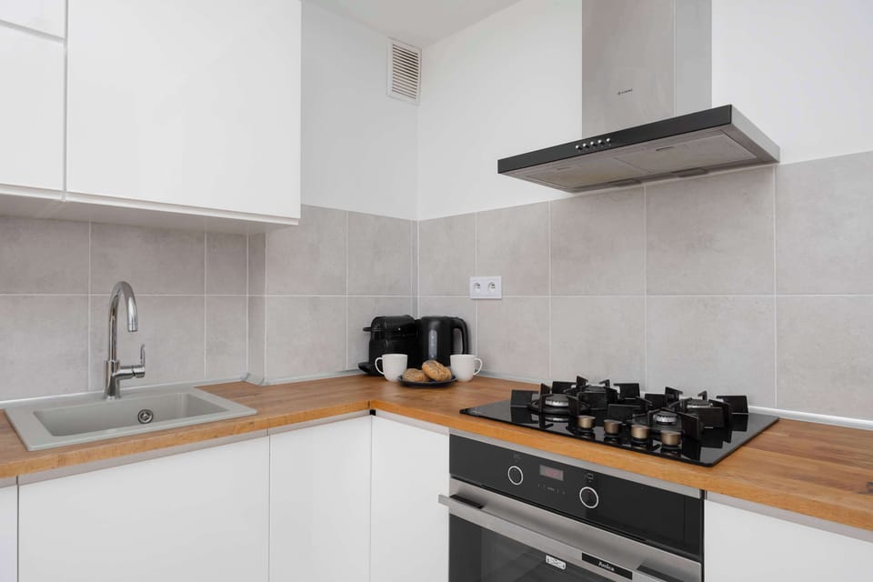 The kitchenette's practical layout maximizes space and functionality.