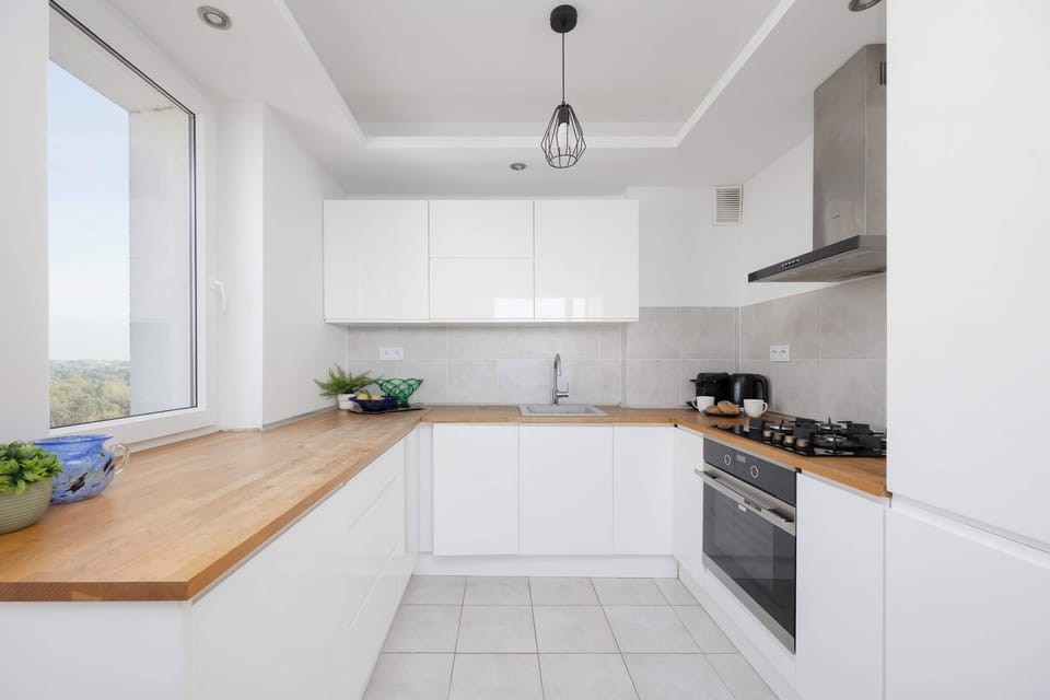 The fully equipped kitchenette includes everything you need for a home-cooked meal.