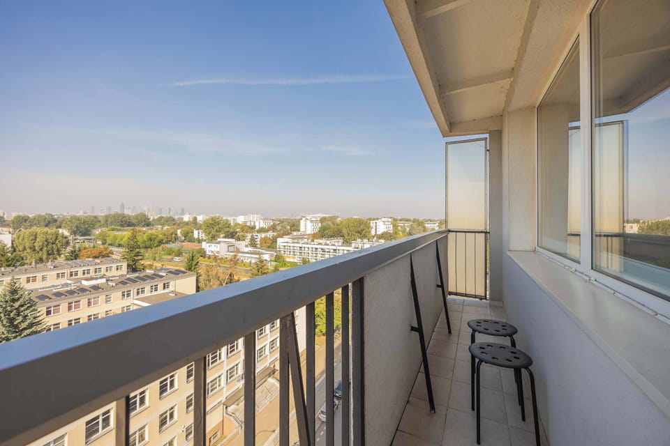 The balcony provides a perfect spot for enjoying the fresh air.