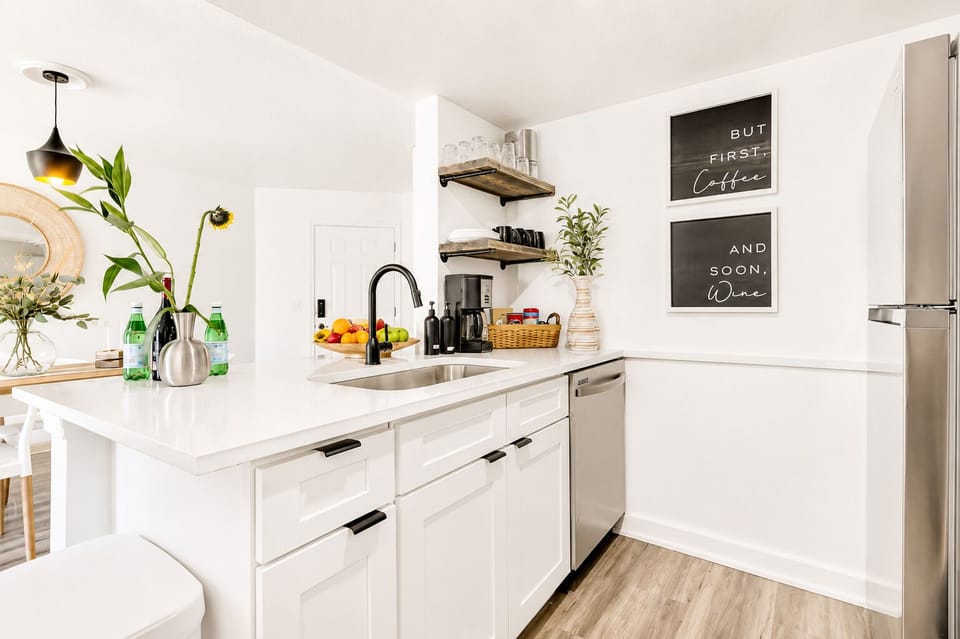 Bright modern kitchen with coffee station and stylish open shelving