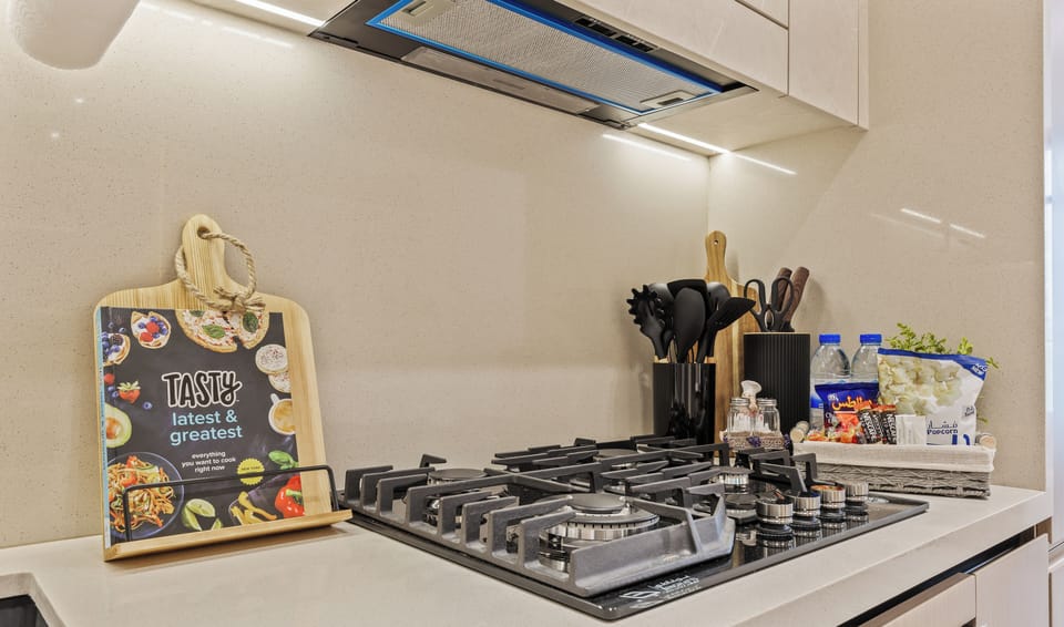 Standard Apartment, Balcony, Pool View | Private kitchen | Full-size fridge, microwave, oven, stovetop