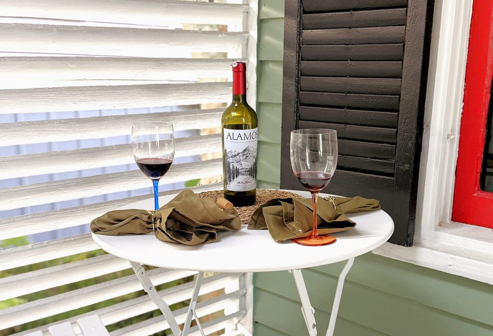 Enjoy evening cocktails on the back porch deck. Perfect spot!