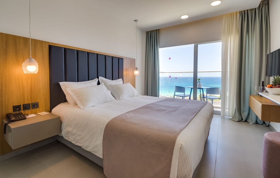 Standard Room, Sea View | Hypo-allergenic bedding, minibar, in-room safe, desk