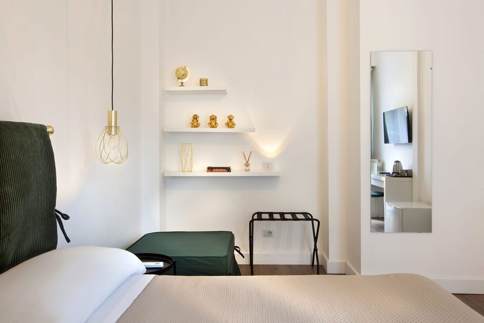 Luxury Triple Room, Patio, Garden View | Desk, laptop workspace, free WiFi