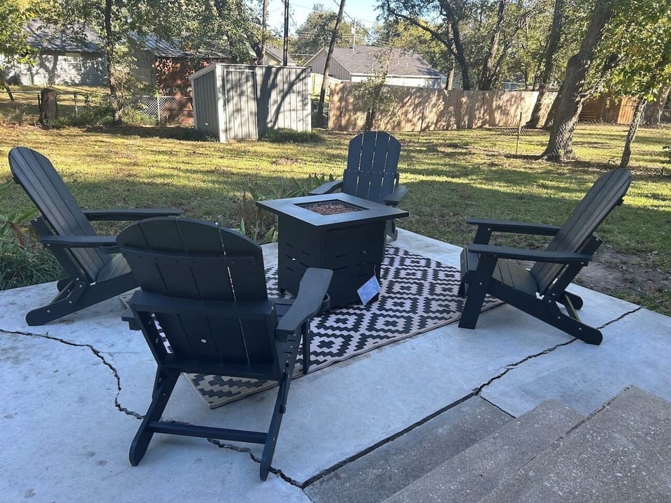 Relax under the stars on the patio with a propane fire pit and seating for four.
