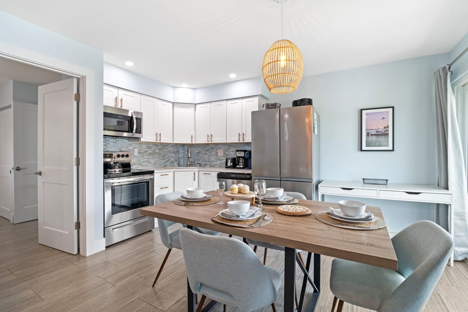A lovely dining area seamlessly in touch with the kitchen.