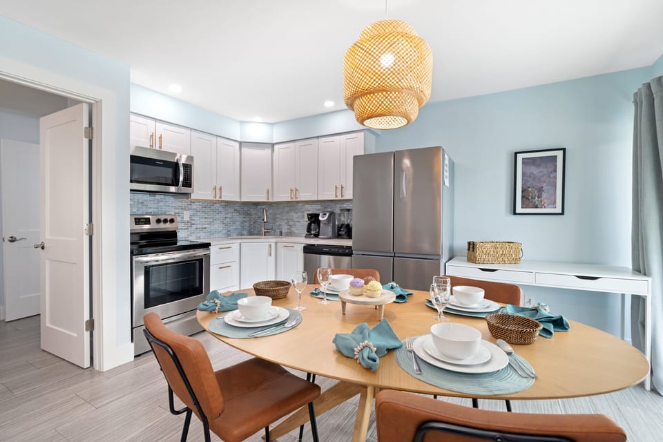 Bright counters and gleaming appliances promise effortless meal prep, the heart of your home-away-from-home.
