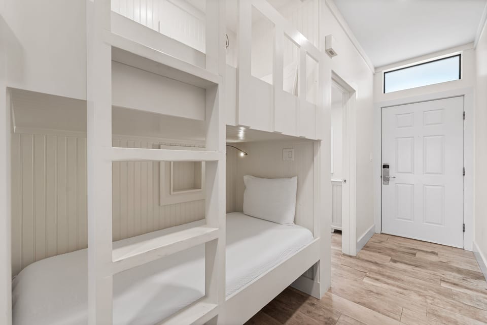 Hallway bunks with memory foam mattresses and charging ports