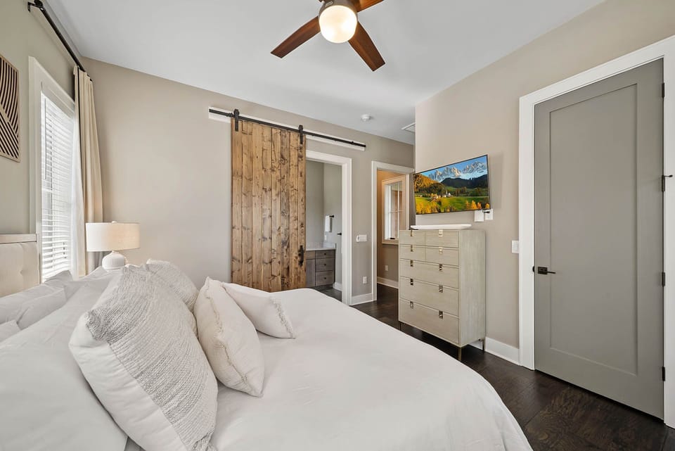 King Bed, TV and Private Bathroom in the Main Level Master Bedroom