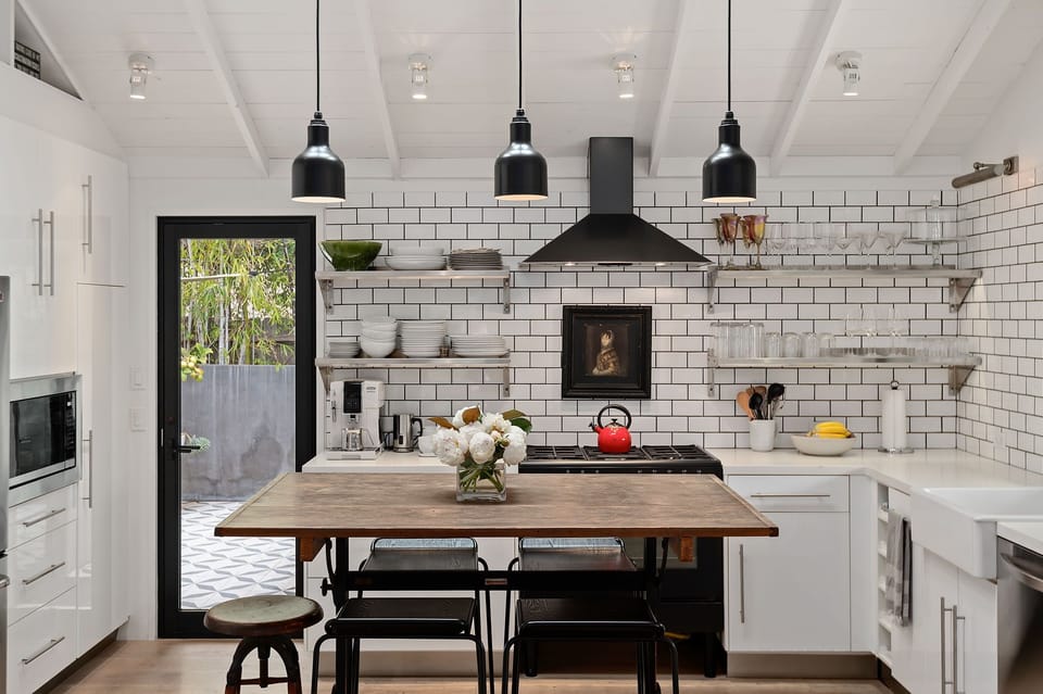 Kitchen island offers barstool seating for indoor dining