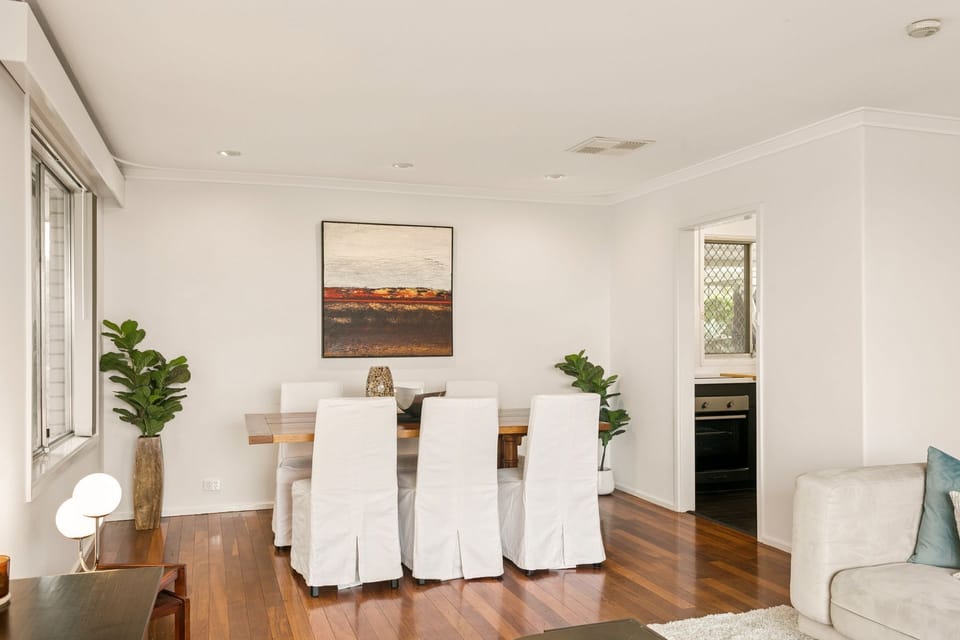 Set for six, the dining room invites long meals and conversations