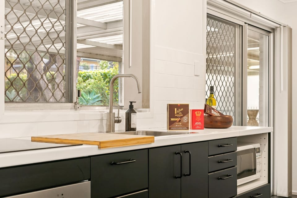 Complimentary touches of premium coffee, wine and Australian Tim Tams