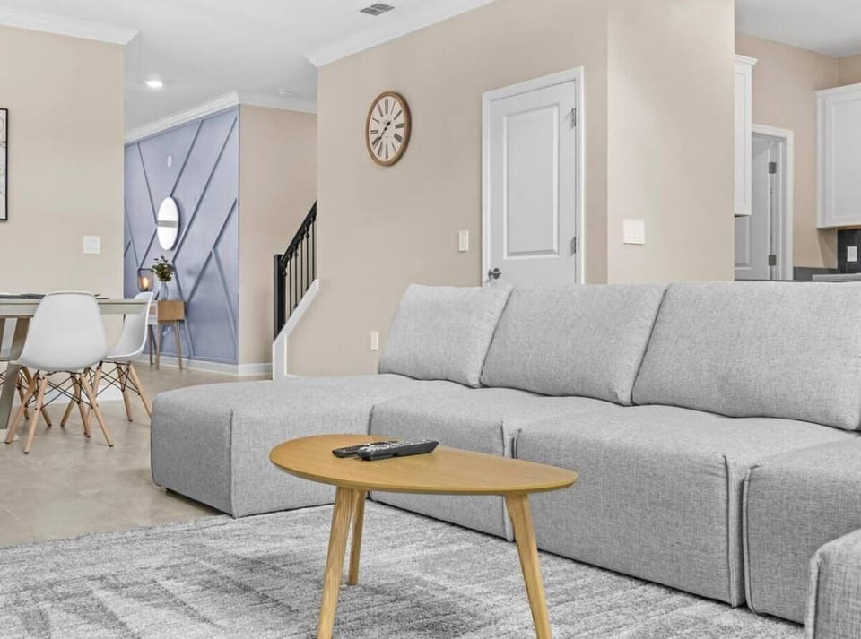 A stylish living room that blends comfort with elegance for a perfect gathering space.