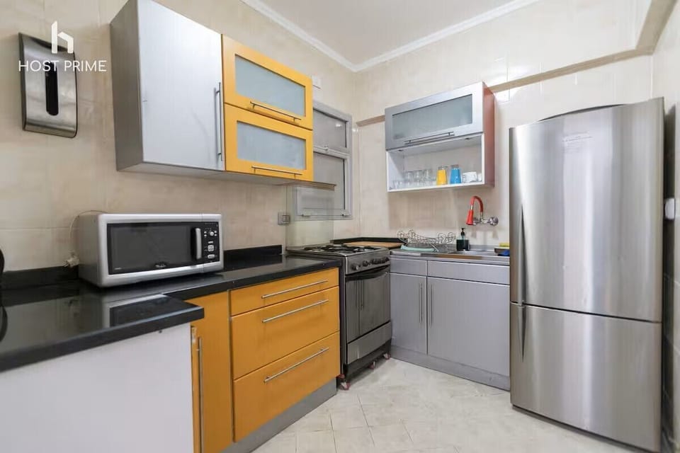 Comfort Apartment, City View | Private kitchen | Espresso maker, coffee/tea maker, electric kettle, cleaning supplies
