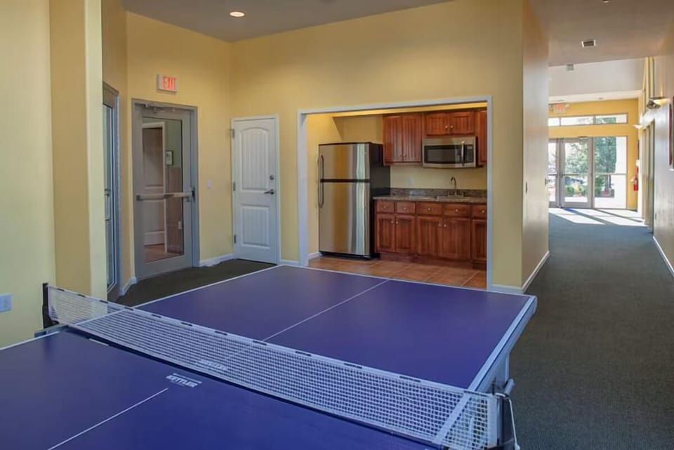 Settle in for friendly competition with games and lounge seating.