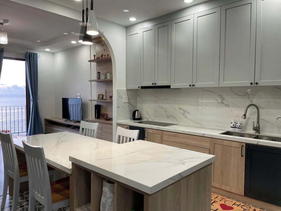 Deluxe Apartment, 2 Bedrooms, Beach View | Private kitchen | Stovetop, cookware/dishes/utensils