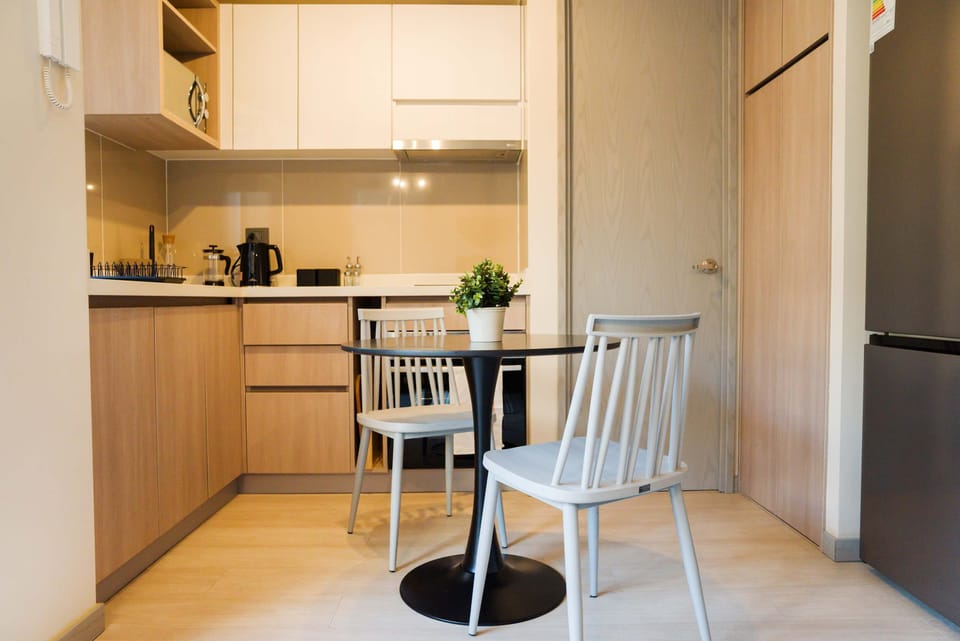 Cozy kitchen with modern amenities, perfect for a quick meal or coffee break.